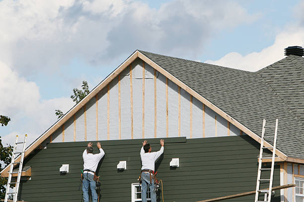 Professional Siding technician working in Weems, VA